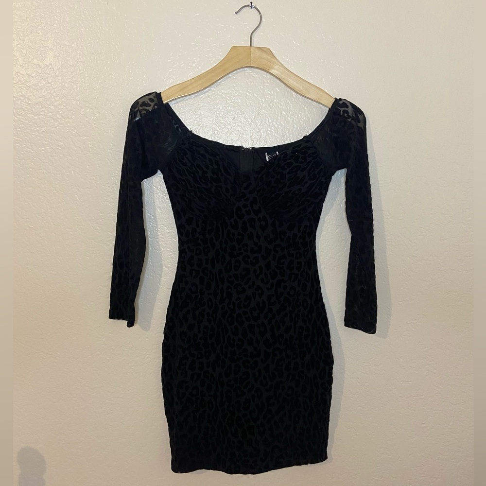 Sexy Cheeta print off the shoulder body fitting black dress